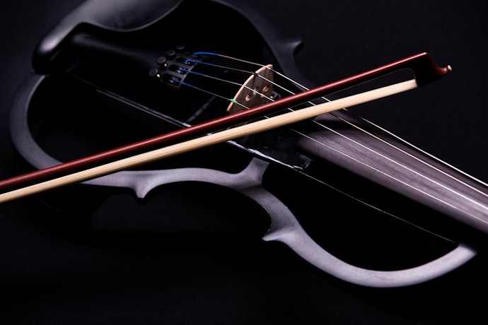 Check if Your Violin Requires Batteries, and Has Volume and Tone Controls, When Playing With Headphones