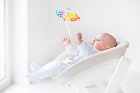 Choose a Bouncer Chair or a Jumper Seat Based on Your Baby's Age