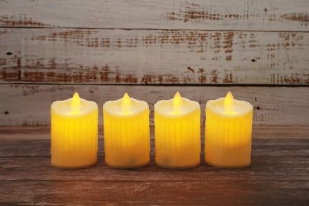 For as Realistic a Look as Possible, Go for Candles With a Wax Casing and Flickering Flames