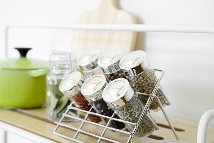 Decide between free-standing, drawer-style, spinning or wall-mounted racks