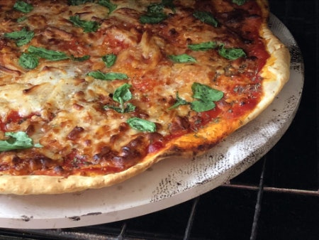 Decide on a Shape and Size That's Best Suited to the Type of Pizza You're Cooking and the Dimensions of the Oven or BBQ You Will be Using