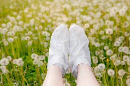 Ties, Tabs or Stickers Help Make the Experience of Using a Foot Mask More Convenient