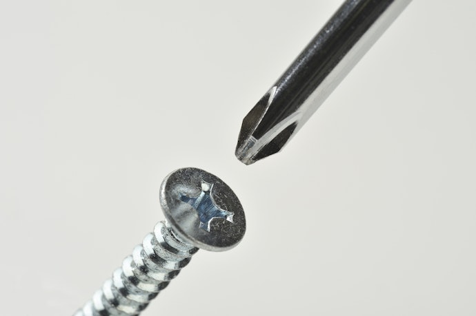 Restrictors Affix to Surfaces With Tape, Screws or a Combo of Both