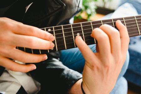 The Length of the Neck Will Affect a Player's Ability to Reach the Strings and the Tension