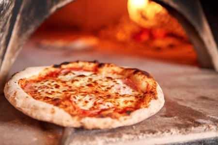 Select either a Wood or Charcoal Assembly Oven Based on Your Budget and Preferences