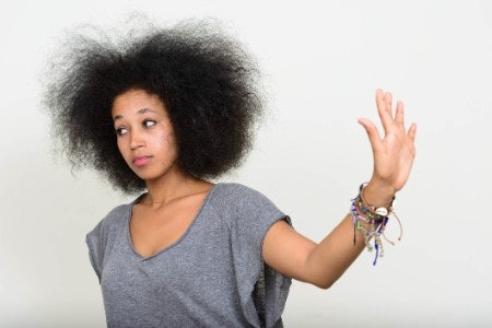 Avoid Drying Ingredients Like Silicones and Stay Away From Humectant-Infused Formulas During Humid Weather