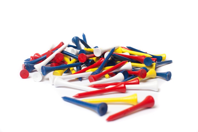Consider the Material: Bamboo Tees Are Better for the Environment but Plastic Tees Offer Durability