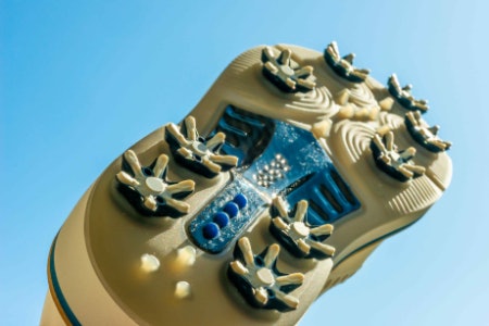 Choose Spiked Soles for Sturdy Grip or Spikeless for an Agile Shoe You Can Wear Off-Court