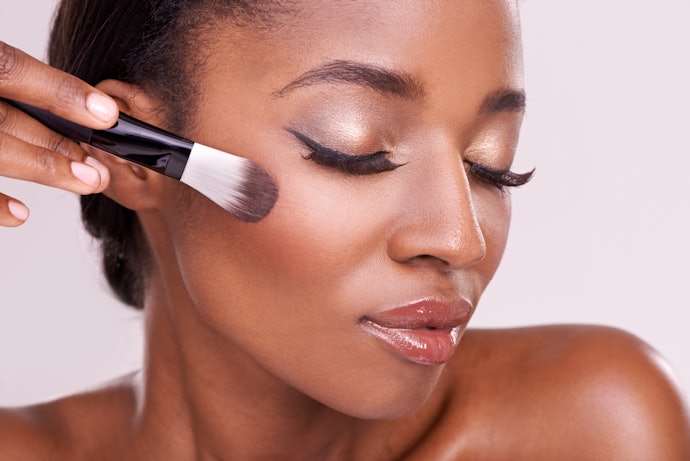 Look for a Bronzer With Red Undertones That's One Shade Darker Than Your Natural Skin Tone