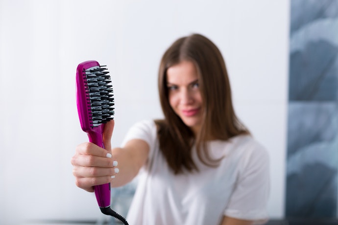Choose a Paddle Brush for Detangling, or a Barrel Brush to Add Volume