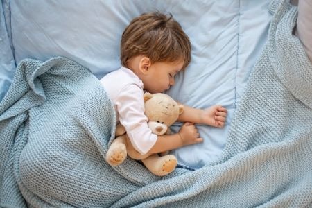 Use the Age Advice and Your Instinct to Decide Whether Your Child Is Old Enough for a Bed