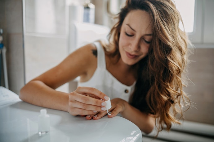 Pick a Wide Brush for an Even Coat, or One With a Fine Tip for Those Interested in Nail Art