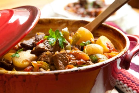 Choose a Round Dish for Stews, Oval for Cooking Joints of Meat, or Shallow for Simmering and Browning