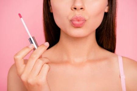 A Shimmery Gloss Plumps Your Lips And Deals With the Cold Dry Winters