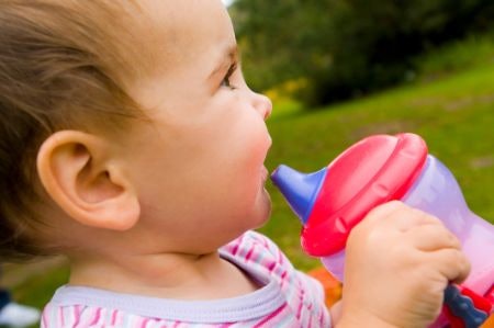 Cups With Spouts or Straws Keep Liquid off the Teeth