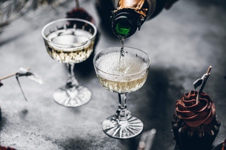 Choose a Coupe Glass or Champagne Saucer for a Vintage Feel