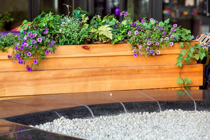 Wooden Plant Pots Absorb Water, Making Them Ideal for Summer Flowers