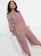Asos Design High Neck Long Sleeve Jumpsuit in Floral 1