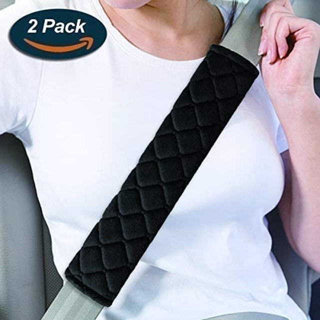 Seat belt outlet pads for adults