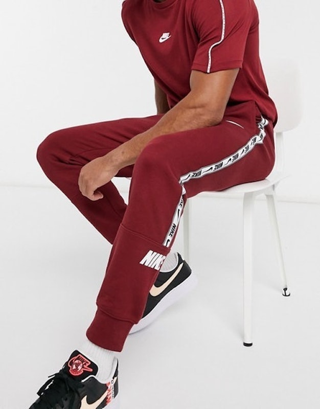 Repeat Pack Logo Taping Cuffed Joggers in Burgundy 1