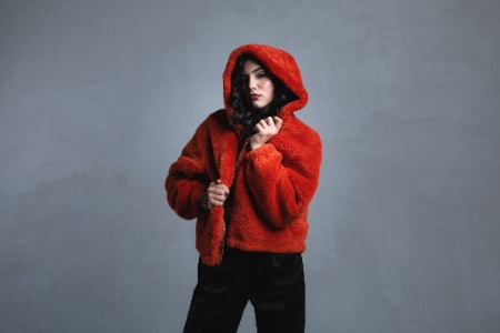 Select a Jacket With a Hood or a High-Necked Collar for Cold Temperatures, or Go For a Spread Collar for Something More Stylish