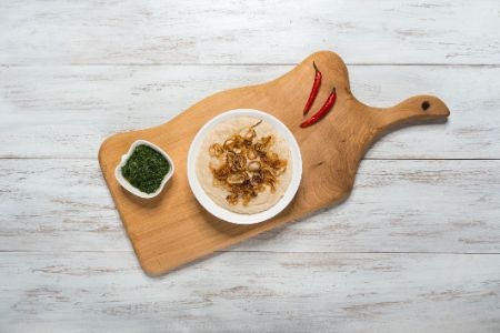 Choose a Hummus With a Topping Such as Olive Oil or Seasoning to Enhance Taste and Texture
