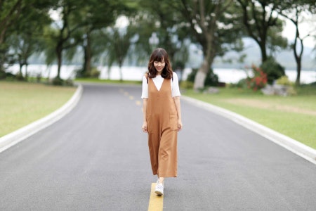 Go For a Jumpsuit With a High Waist Line to Help Your Legs Look Longer, or Define Your Figure With a Waist Tie