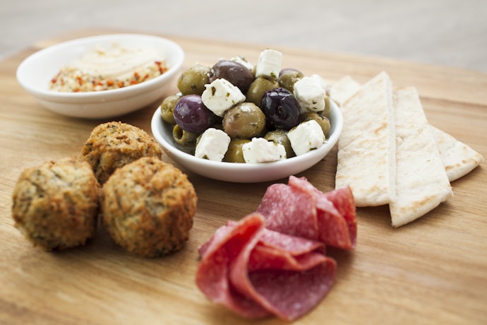 Treat Yourself With a Snack Pack of Olives Combined With Cold Pressed Oils, Herbs, Cheese or Tomatoes